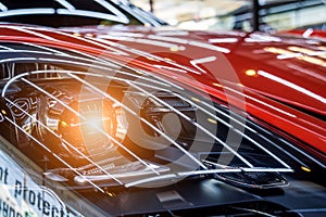 Headlights and details of red sport car