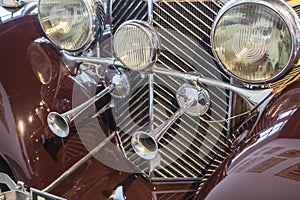 Headlights and horns on a classic car