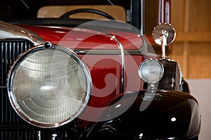 Headlights and mirrors of an antique car