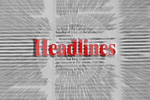 Headlines written in red with a newspaper article blurred