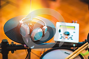 A headphone and Electric drum on the stage