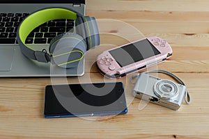 Headphone, game console, mobile phone, digital camera and laptop computer