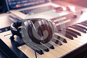 Headphone on home Music studio keyboard