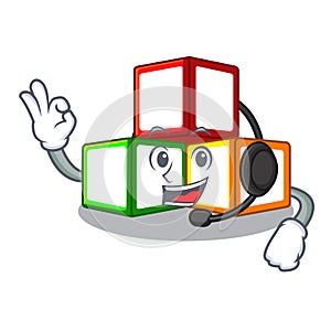 With headphone toy blocks on cube boxes mascot