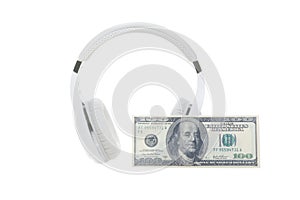 Headphones and banknote
