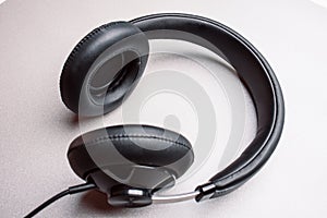 Headphones on a light gray desk