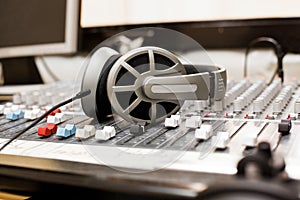 Headphones lying on the mixing console