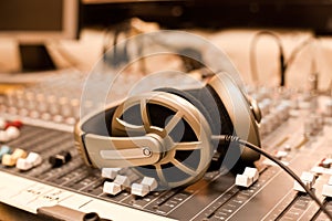 Headphones lying on the mixing console