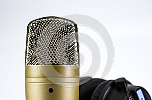 Headphones and Microphone on a White Background.