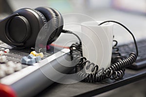 Headphones With Spiral Cord In Radio Studio