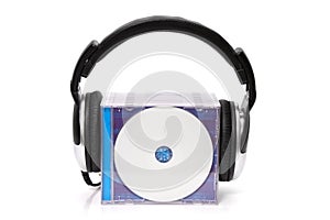 Headphones with stack of cds