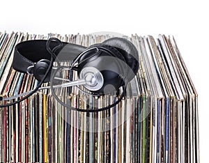 Headphones and stack of vinyle records.