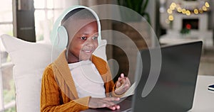 Headphones, technology and boy kid doing math counting for assignment, project or homework. Elearning, laptop and young