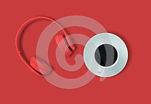 A headphones, Top view of headphones and black coffee cup on red background. Minimalist photo of earphones with copy space. red dj