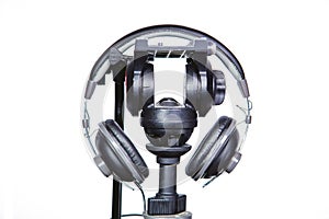 Headphones and a tripod on a white background Musica, audio reco photo