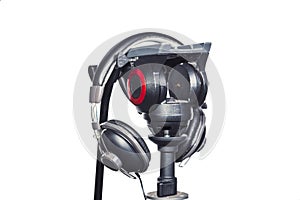 Headphones and a tripod on a white background Musica, audio recording photo