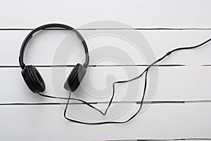 Headphones on white wood
