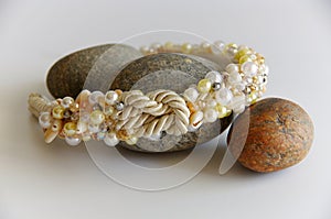 Headpiece of beads and shells.