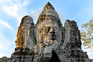 Heads on the entrance tower to Angkor Thom, Cambodia. Angkor Thom was the last and most enduring capital city of the Khmer empire.