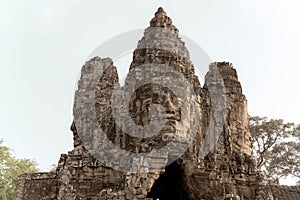 Heads on Temple in Angkor Thom, Khmer Temple, Siem Reap, Cambodia. Old photo style