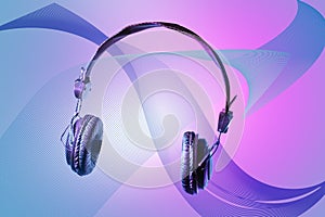 Headset on beautifull design background. Isolated on technological concept of developing sound and music listening devices