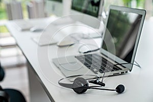 Headset and customer support equipment at call center ready for actively service