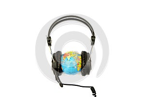 Headset on globe isolated on the white