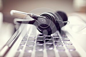 Headset on a laptop computer keyboard