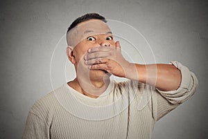 Headshot afraid victim man with hand covering his mouth