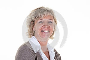 Headshot of blond senior woman smiling happy standing at isolated white background