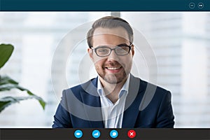 Headshot of businessman talk on video call with client