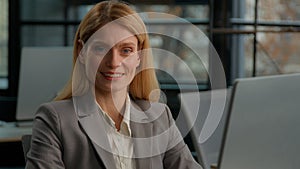 Headshot close up business portrait female smiling businessperson Caucasian adult middle-aged businesswoman happy with