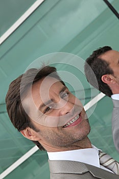 Headshot happy male employee