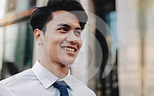 Headshot of Happy Urban Businessman in the City