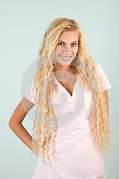 Headshot portrait of beautiful young blond woman
