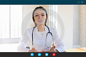 Headshot portrait of female doctor consult patient online