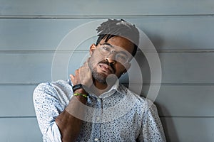 Headshot portrait of handsome bearded young man of african ethnicity