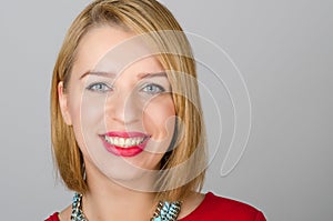 Headshot portrait of a happy woman