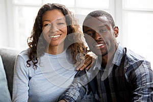 Portrait of happy mixed race couple posing for picture