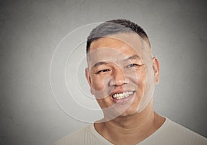 Headshot portrait of middle aged man happy smiling