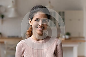Headshot portrait of smiling Caucasian woman renter
