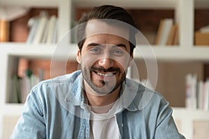 Headshot portrait of smiling man talk on video call