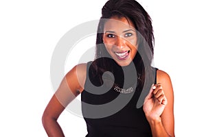 Headshot portrait of a young african american woman making tongue out,isolated on white background