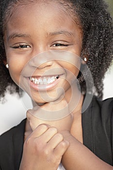 Headshot of a smiling child