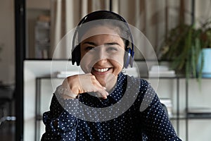 Headshot of smiling Indian woman talk on video call