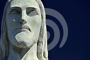 Headshot of the statue Christ the Redeemer is an Art Deco statue in Rio de Janeiro