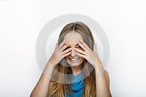 Headshot of young adorable blonde woman with cute smile on white background