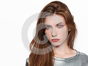 Headshot of young beautiful excited woman with gorgeous natural red hair, red lips, green eyes on white background