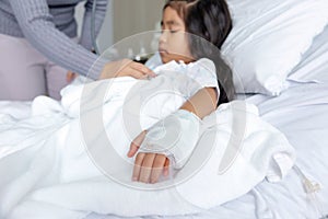 Heal Influenza A virus or H1N1 flu asian kid on hospital bed