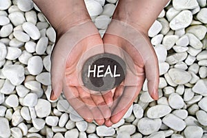 Heal word in stone on hand